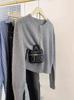 Women's Loose Wool Knit Cardigan - Round Neck, Solid Color, Buttoned, Casual Autumn/Winter Style, Versatile and Stylish.