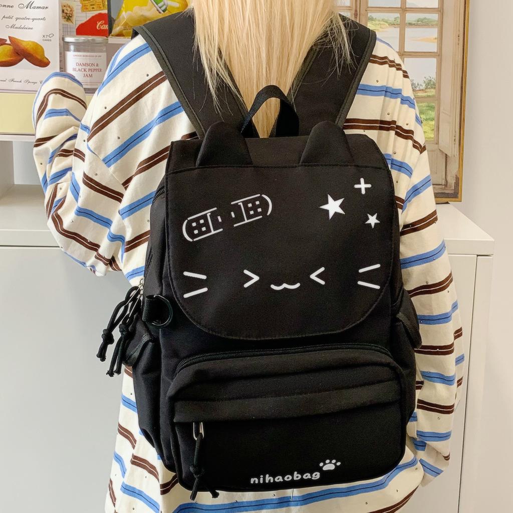 Schoolbag student schoolbag removable shoulder pain bag kaomoji black cat bag junior high school schoolbag female comic book baby bag