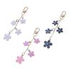 Elegant Flower Keychain Sturdy Alloy Bag Charm Fashion Accessory for Trendy Women Ladies Waterproof Oil Drop Designs