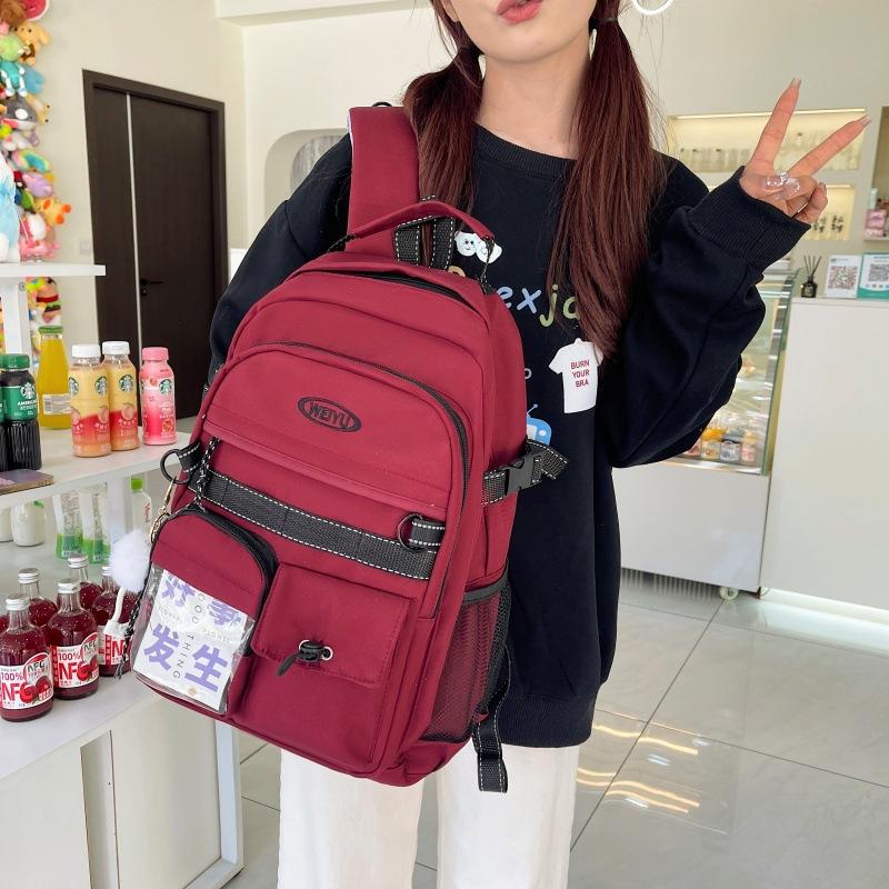 Junior and high school large-capacity class schoolbag female solid color simple leisure travel backpack fashionable canvas versatile backpack