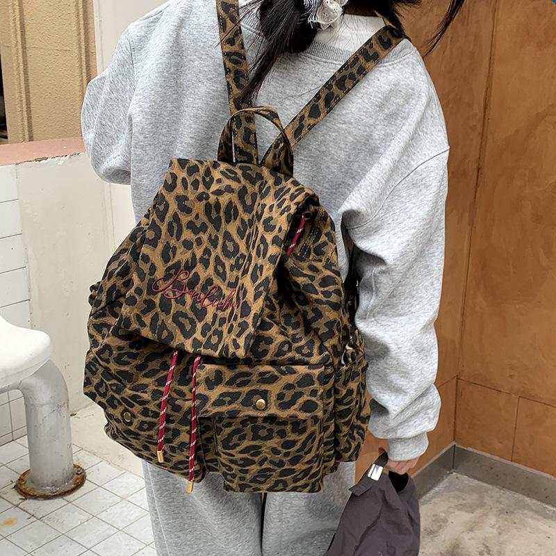 Sac à dos1011 nouveau sac à dos en toile imprimé léopard grande capacité sac de ville pour femme style décontracté sac à dos décontracté sens de la mode