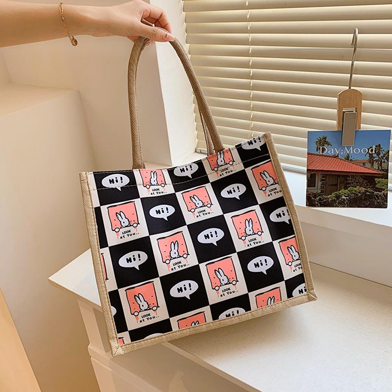 New Printed Large Capacity Fashionable Commuting Women's Bag for College Students In Class One-shoulder Tote Bag Handheld Cotton and Linen Bag Trend