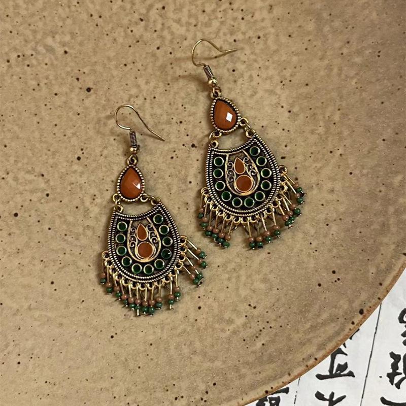 Chinese style dripping oil, water dripping rice beads, fringed ear hooks, retro earrings, personalized creativity, high-end earrings, women