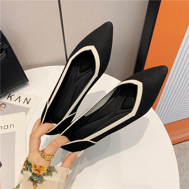 Neue Prinzessin hat die gleichen fliegenden gestrickten Damenschuhe, spitze und atmungsaktive flachsohlige Einzelschuhe, gestrickte bequeme weichsohlige Einzelschuhe.