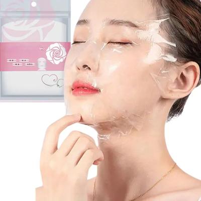 100 pezzi monouso pellicola di plastica per il viso maschera detergente per il viso completo adesivi per il collo carta trasparente PE maschere avvolgenti strumento di bellezza per il viso sano