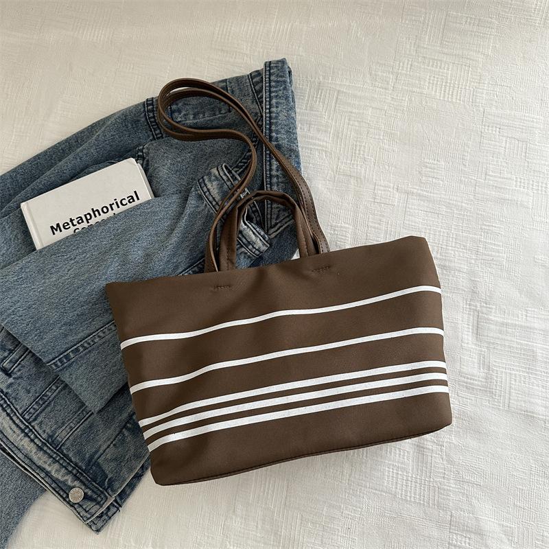 

Korean version of retro literary handbag simple trendy contrasting colors beautiful tote bag casual fashion large capacity shoulder women s bag