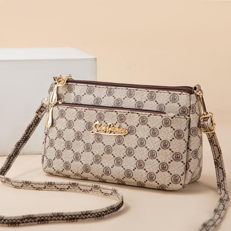 

Mobile phone bag Crossbody women s new old flower armpit bag Fashion trend women s printed women s bag