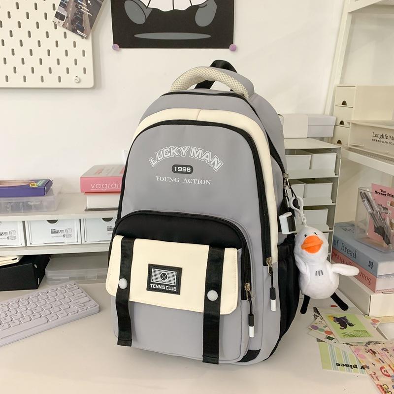 Schoolbag cute college style backpack male junior high school student schoolbag female large capacity laptop bag Korean version tide