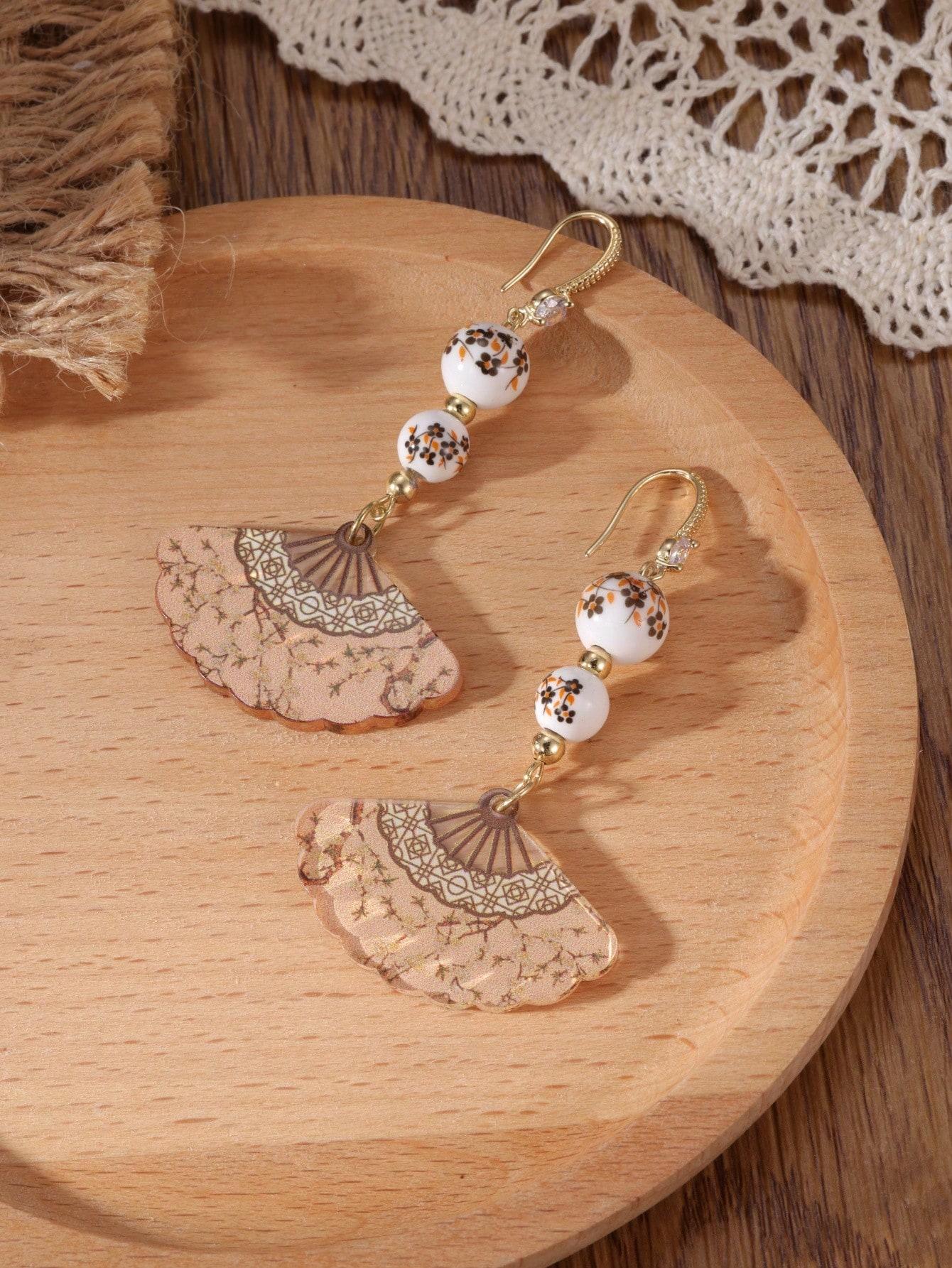 

Модные серьги-подвески для женщин коричневый