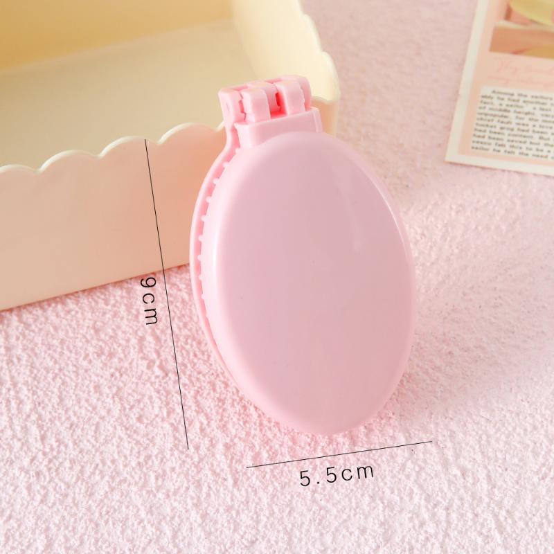 Portable Folding Hair Comb With Mirror, Lightweight & Travel-Friendly For On-The-Go Styling. A Perfect Gift For Women & Girls.