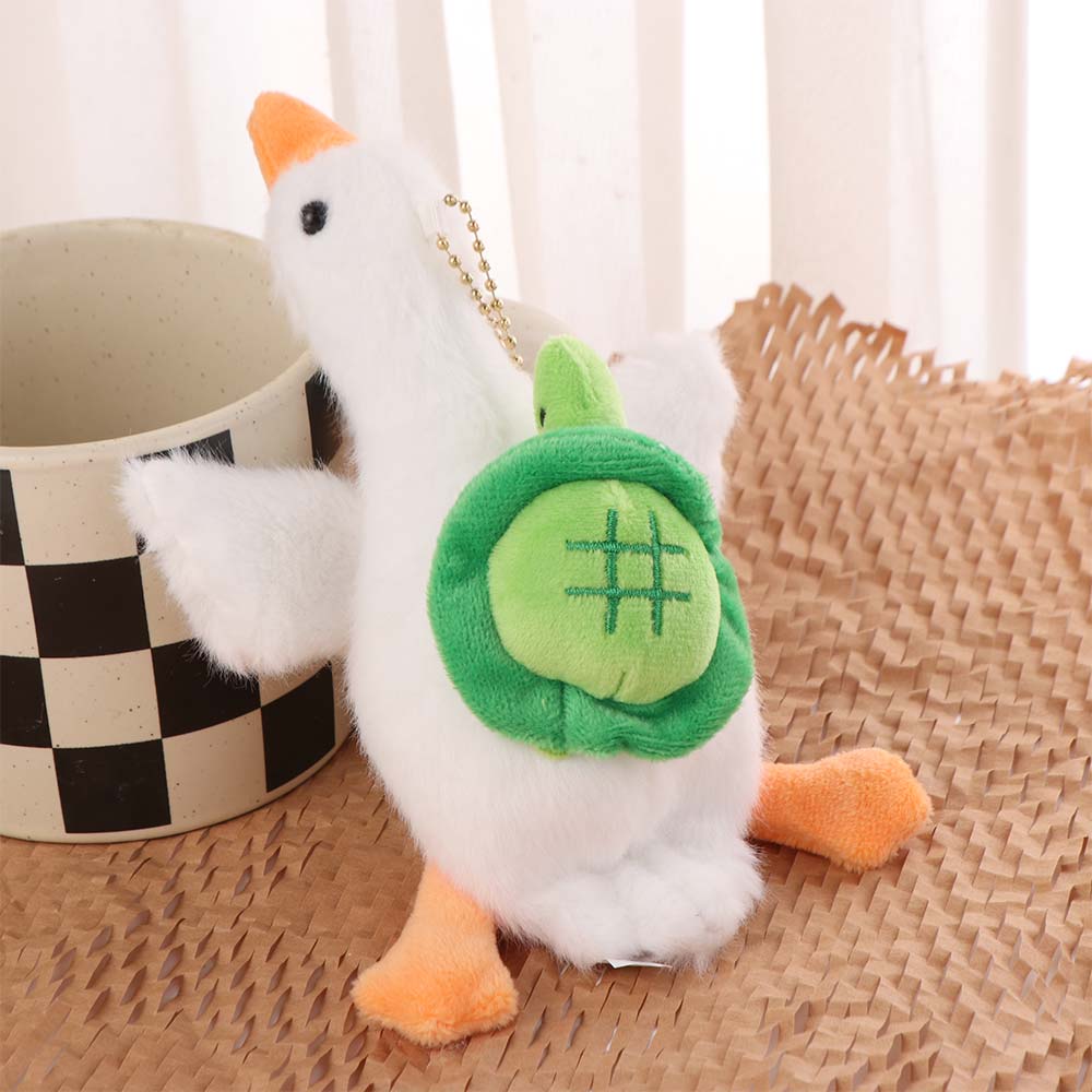 Porte-clés en peluche canard moelleux peut tirer peluche dessin animé canard porte-clés décoration de sac à dos