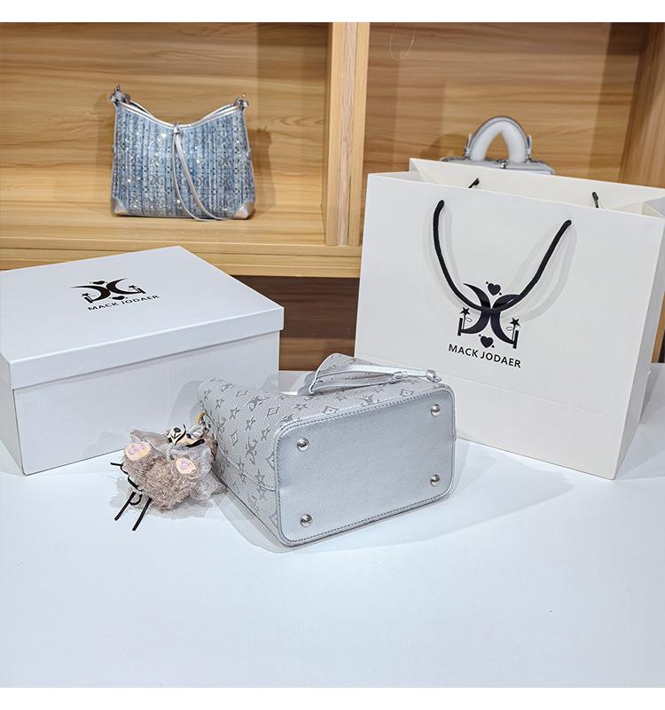 Women's Large Capacity Single Shoulder Bucket Bag with Inner Lining, Compartment Organizer, and Zippered Middle Section.