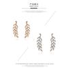 Fashionable Symmetrical Hollow Leaf Earrings New Alloy Long Earrings
