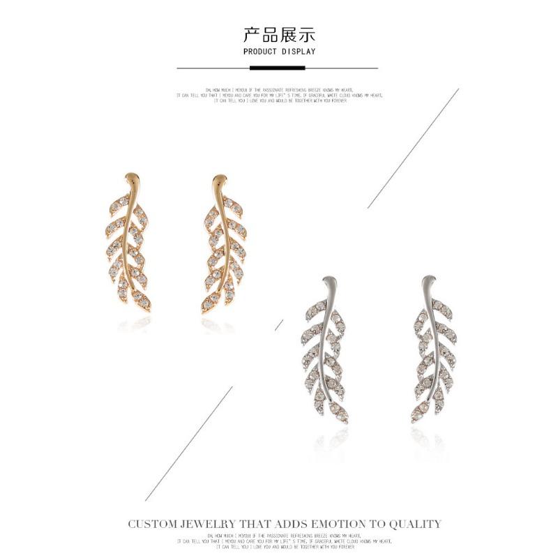 Fashionable Symmetrical Hollow Leaf Earrings New Alloy Long Earrings
