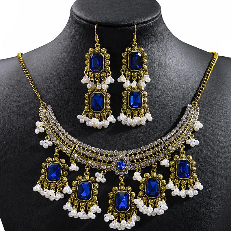 

Набор украшений из богемского хрусталя: Этническое ожерелье с кисточками и серьги со стразами