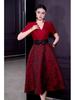 French Spring/Summer 2026 Women's V-Neck Black Bow Tie Jacquard Dress with Waist-Cinching and Wide Hem.