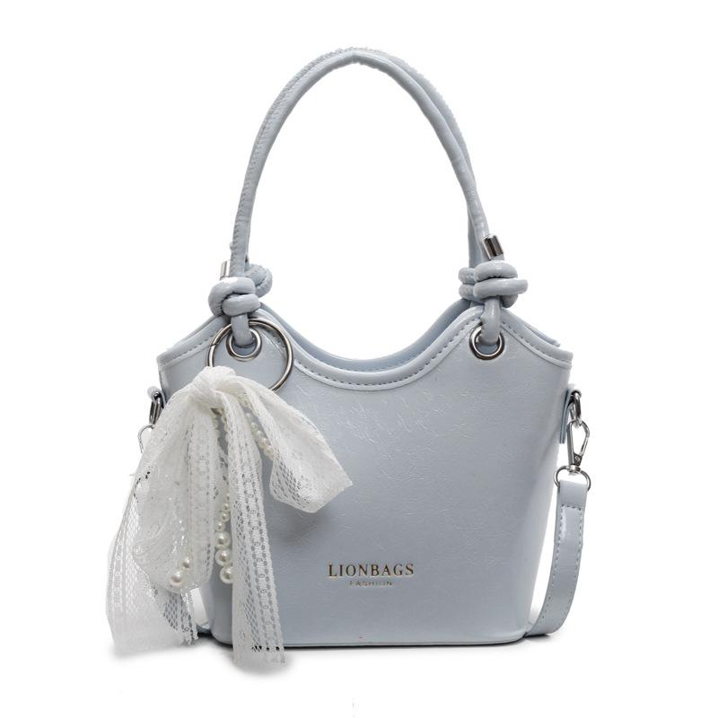 

Trend fashion super fire portable bucket bag women 2025 new light luxury niche high-end commuter shoulder messenger bag синий