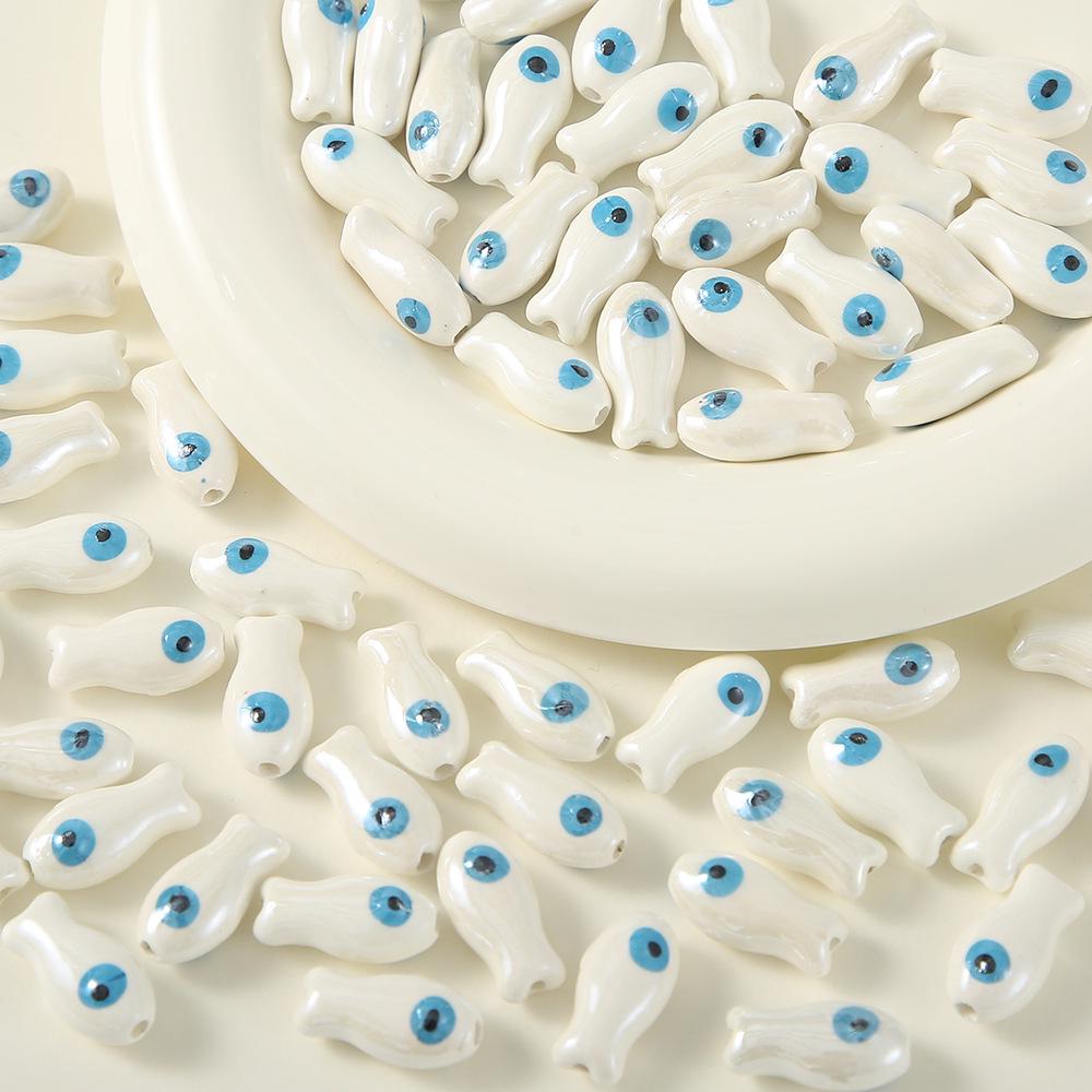 

2024 Расписанные вручную керамические милые бусины в виде рыбок для изготовления браслетов и серег своими руками 10x20mm (Price per piece)