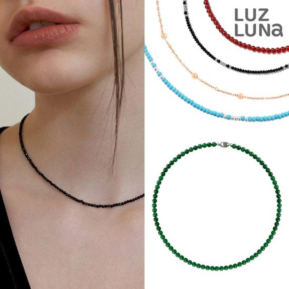 A Collection of Colorful Summer Gemstone Bead Layered Necklaces.