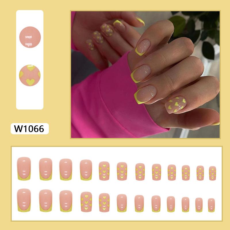 

Simple French yellow love autumn warm heart manicure fashion popular duck shit yellow wearable manicure