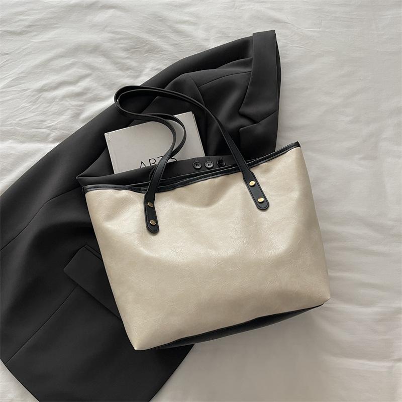 

Autumn new fashionable versatile single shoulder work leisure class commute niche tote women s bag