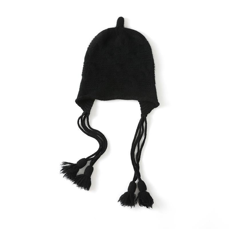 Autumn and winter new commuter women's knitted wool hat warm ear protector fringed pendant handmade twist all-match hat