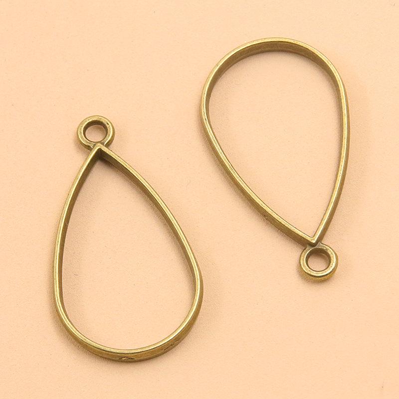17 Ancient Green DIY Alloy Jewelry Pendants: Moon, Round, Heart with Drip Glue and Hollow Borders.
