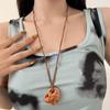 Women's Cute Knot Bread Pendant Necklace: Stylish Long Sweater Chain with Niche Design for a Fashionable Touch.