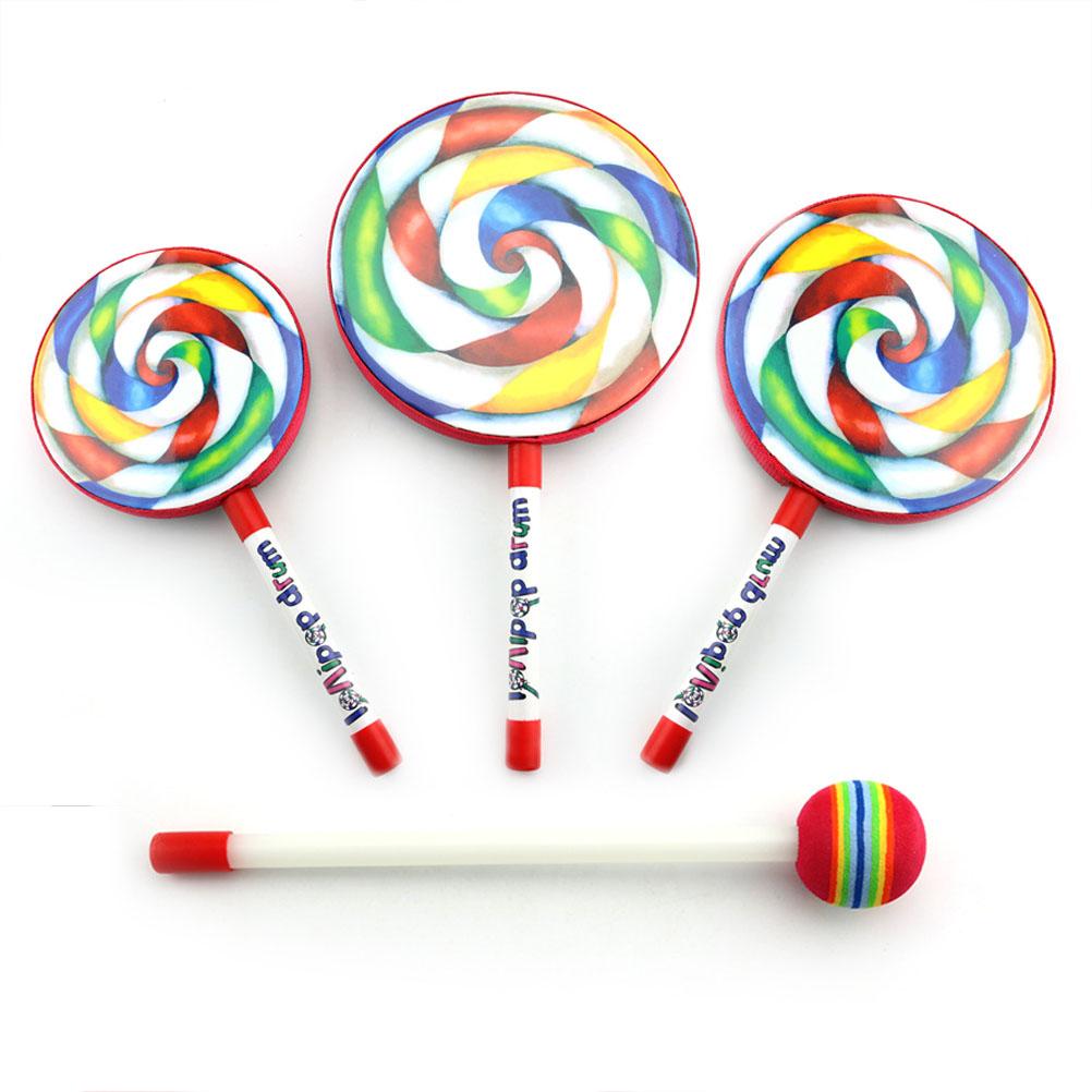 Roztomilý bubínek ve tvaru lízátka s paličkou v barvách duhy Hudební rytmické nástroje Děti Miminko Děti