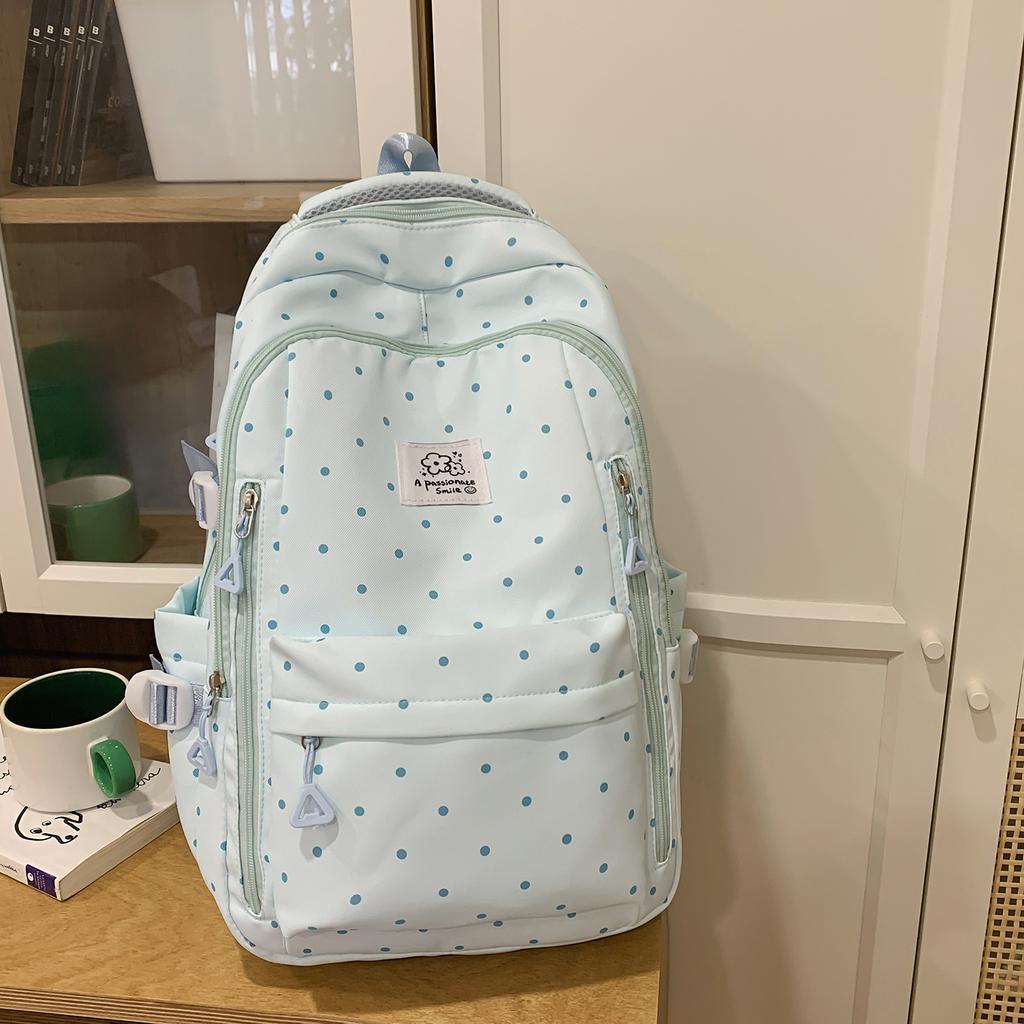 Einfacher Nylon-Rucksack mit Polka-Dots, niedliches Design, lässiger Schülerrucksack mit großem Fassungsvermögen und mehreren Fächern, geeignet für den täglichen Gebrauch und die Schule.