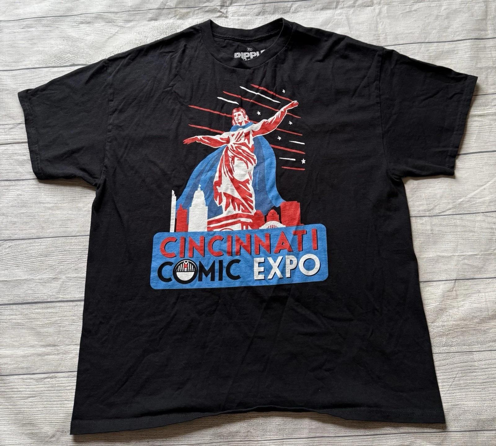

Cincinnati Comic Expo Logo Promotional Graphic T Shirt Size XL Ripple Junction 4XL