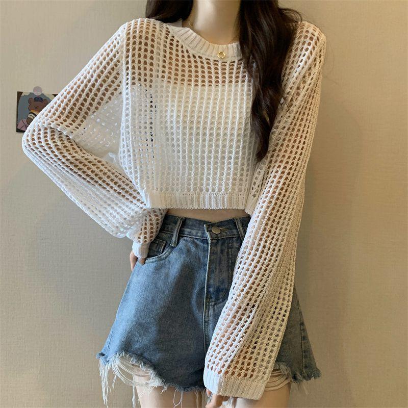 

Summer thin grid hollow knitted sweater women s loose outer wear foreign style short sunscreen outer blouse Spice girl top Average size 52-204 білий