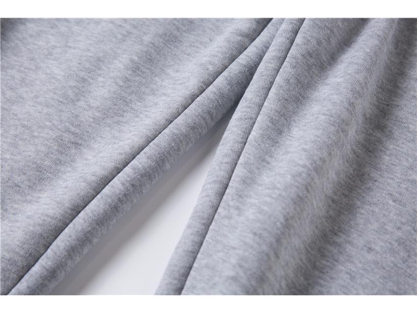 Completo da uomo con felpa con cappuccio e pantaloni della tuta in pile tinta unita