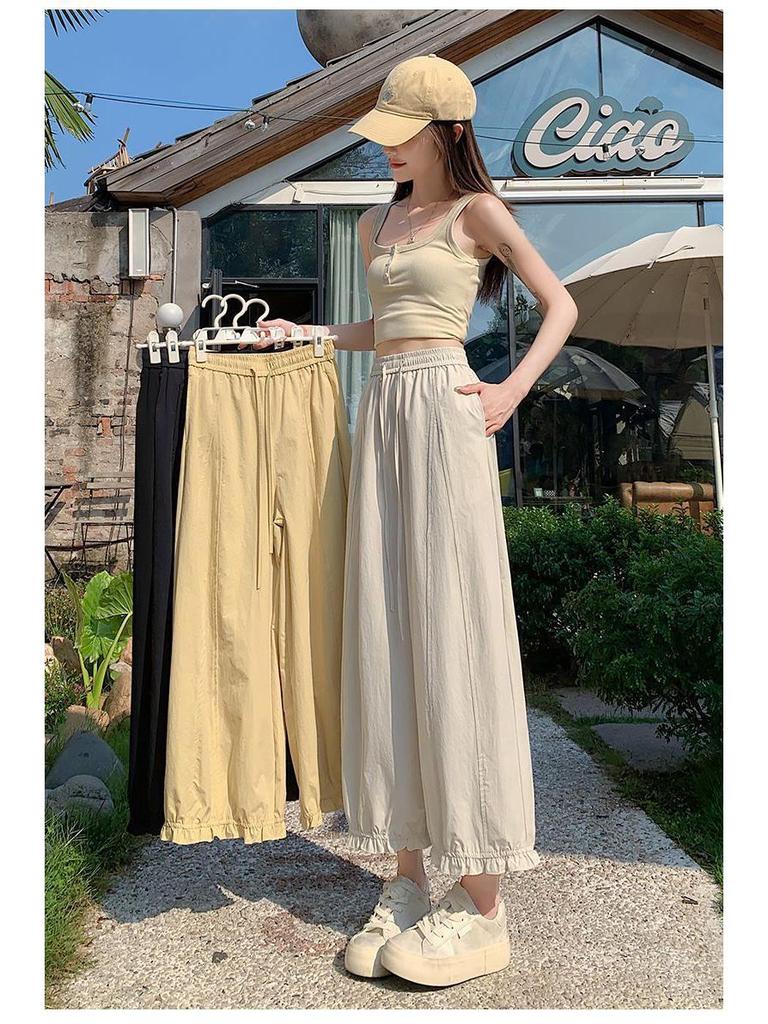 Women's Wide-Leg Ice Silk Pants: Dark Blue, Quick-Drying, High-Waist, Slimming, Lightweight Summer Lantern Style with Side Nine-Point Length.