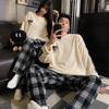 Autumn/Winter Flannel Pajamas: Cozy Round Neck Homewear for Youthful Men and Women