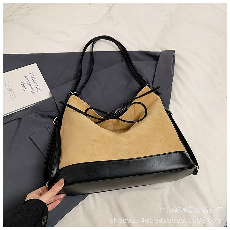 

Large capacity bow backpack women s 2025 new retro commuter shoulder bag matte messenger tote bag tide