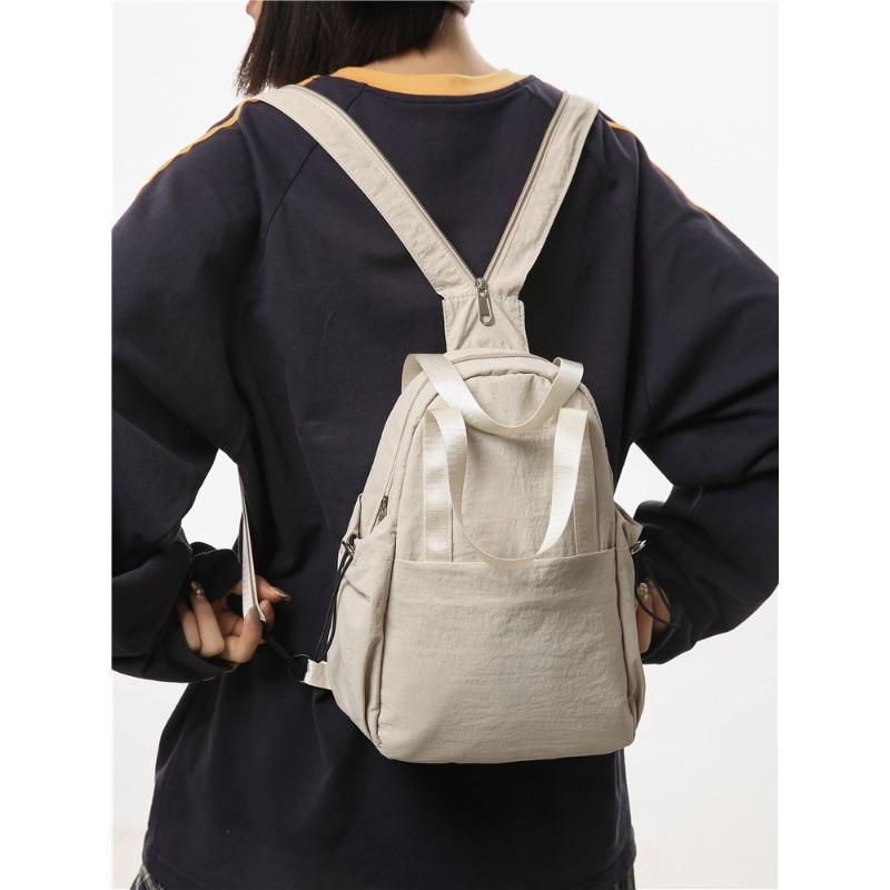 Ghiozdanele sunt populare astăzi, genți de mână de nișă, genți messenger noi, versatile, simple, rucsacuri de călătorie multifuncționale