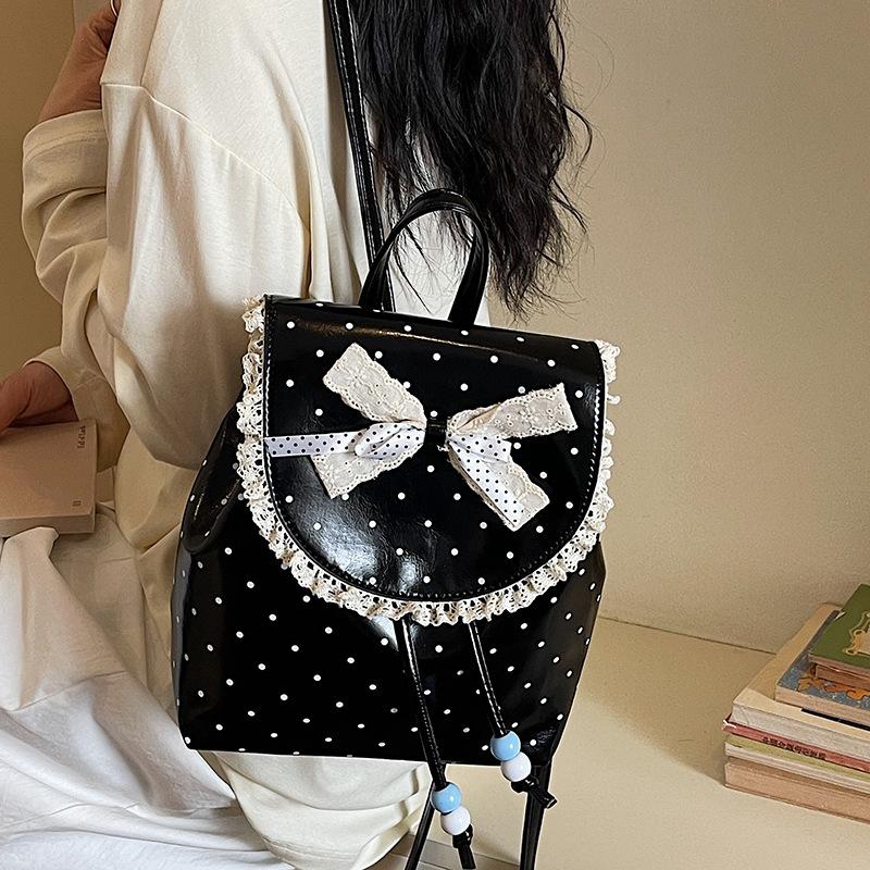 Schulrucksack1011 Frühling neu Spitze Damenrucksack süße Schwester Koreanisch gepunktet lässig retro ausländischer Stil kleiner Rucksack