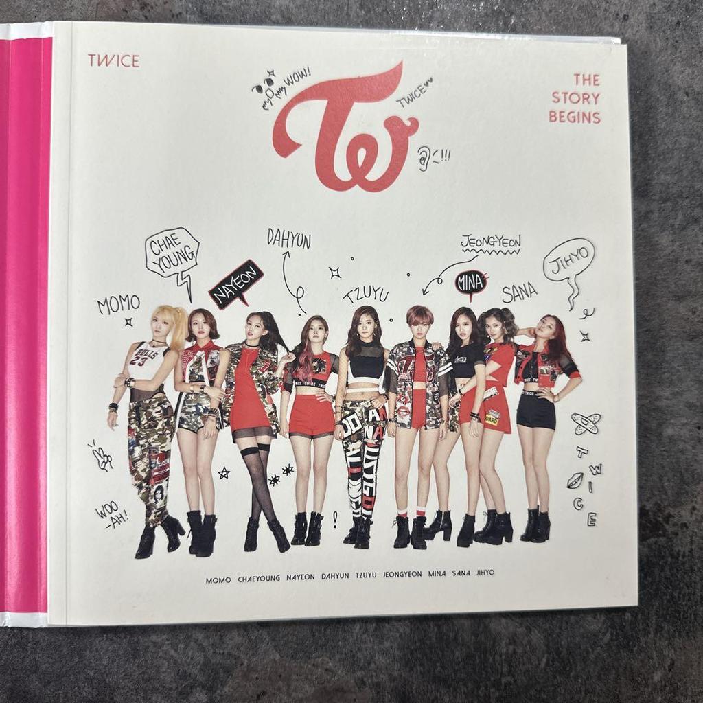 [USED] TWICE autographed the story begins