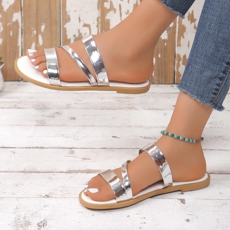 

Large size sandals women s summer new flat bottom fashionable and comfortable one-word women s sandals solid color glossy slippers 42 серебряный