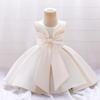 Vestito in Raso da Principessa con Fiocco per il Primo Compleanno di una Neonata