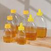 Transparent Reusable Plastic Honey Bottles Squeeze Honey Bottle Container Holder With Lid For Storing And Dispensing Honey Jar