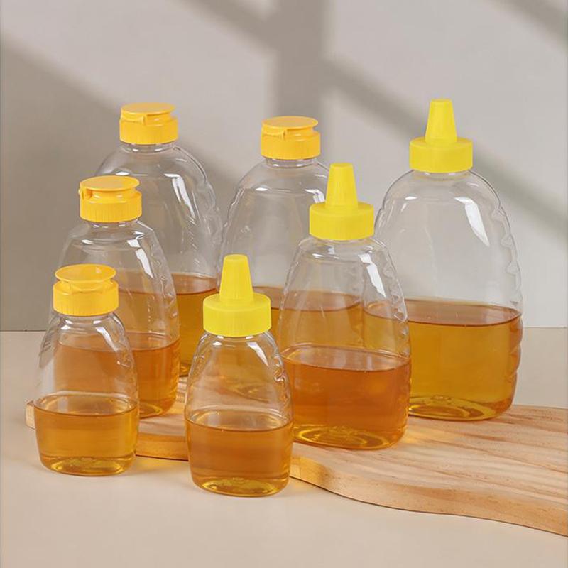 Transparent Reusable Plastic Honey Bottles Squeeze Honey Bottle Container Holder With Lid For Storing And Dispensing Honey Jar