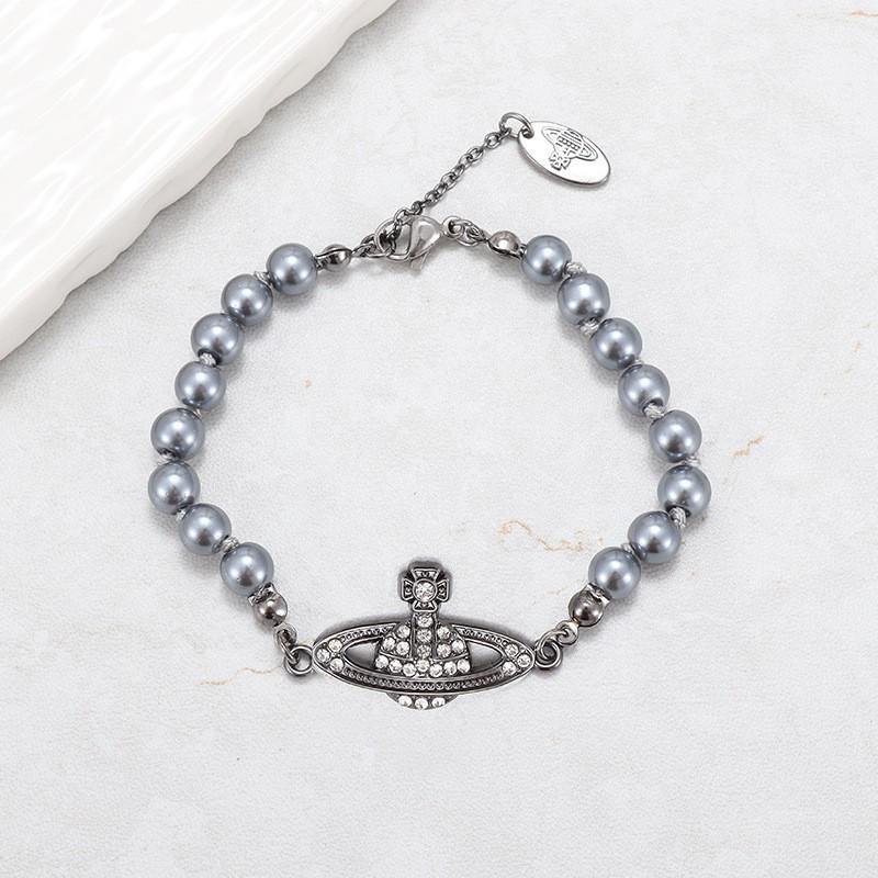 

Колье «Императрица Довагер» цвета «оружейный металл» с бриллиантами и серым жемчугом, с универсальным браслетом и роскошной цепочкой для ключиц