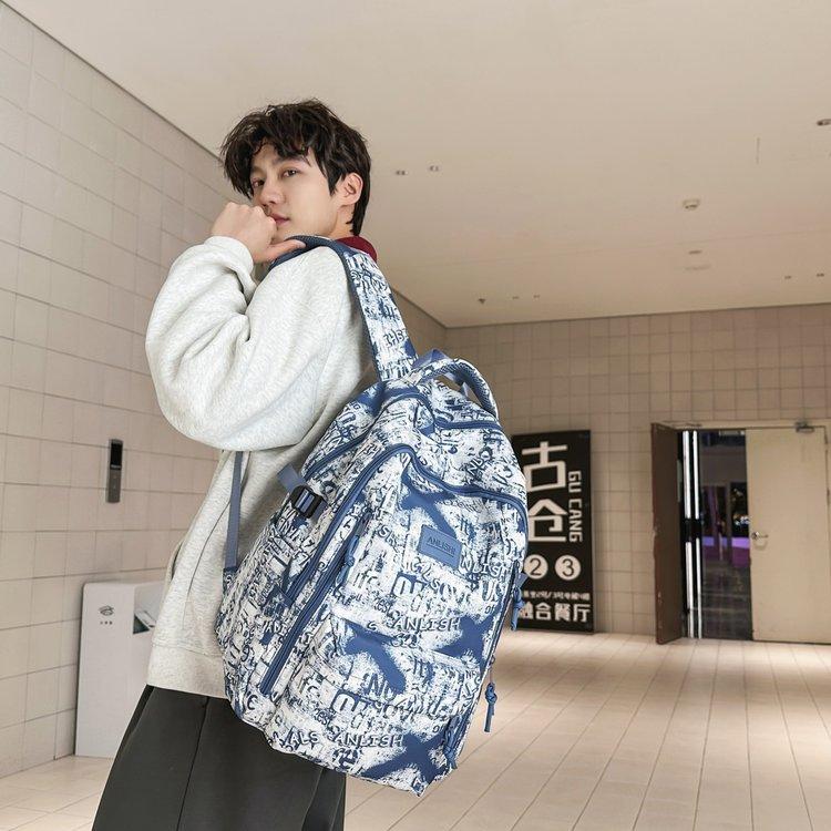 Schoolbag high-value trendy brand fashionable simple graffiti versatile schoolbag 3rd to 6th grade junior high school student backpack