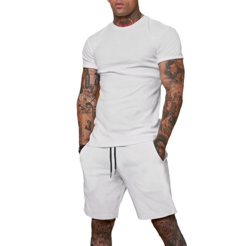 Conjunto de Camiseta de Manga Corta y Pantalones Cortos de Color Sólido para Hombre de Verano - Transpirable y Elegante.