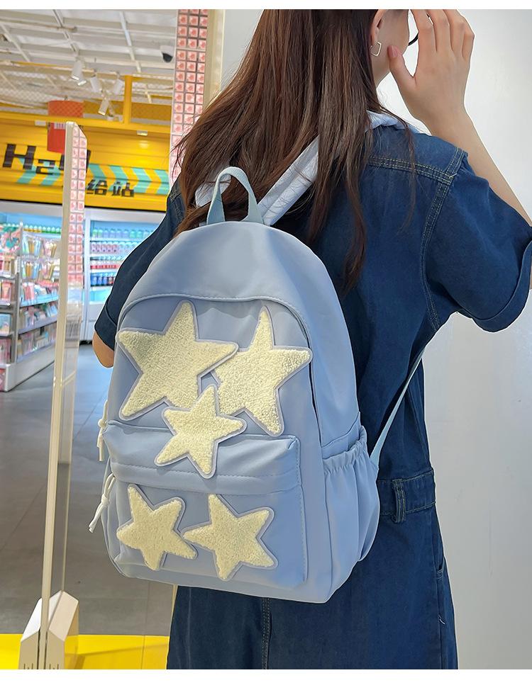 

Школьный рюкзак Новый студенческий рюкзак большой вместимости Школьный рюкзак в виде пятиконечной звезды высокой ценности Простой и модный рюкзак для компьютера озеро синий