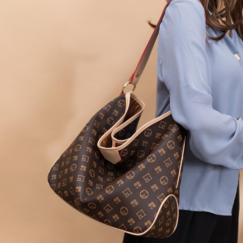 Spring new commuter tote bag large-capacity women's bag versatile printed soft leather shoulder armpit bag