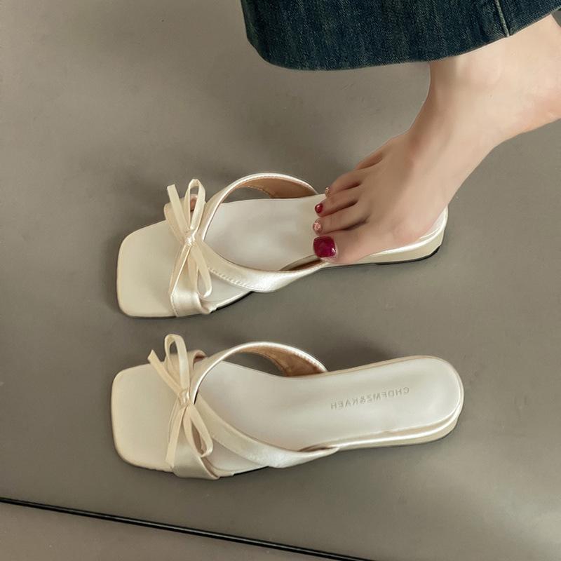 Fashion French temperament gentle and sweet bow low heel cool slippers women's 2025 summer new one-pedal sandals