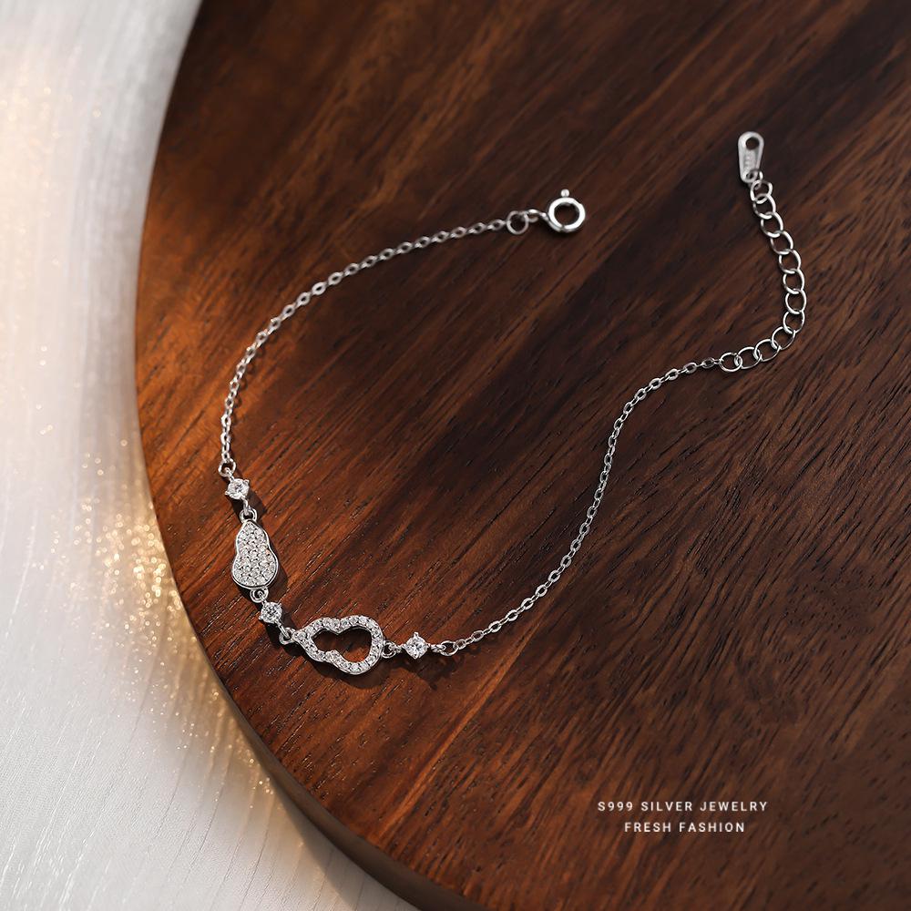 

Elegant S999 Silver Gourd Bracelet for Women - Starry Hollow Design, High-End, Chic Jewelry. Pure Silver